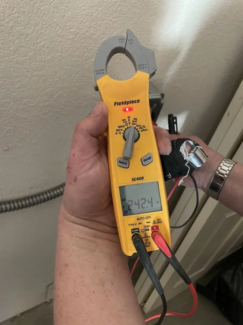 Voltage testing with clamp meter during Circuit Breaker Repair in North Browning